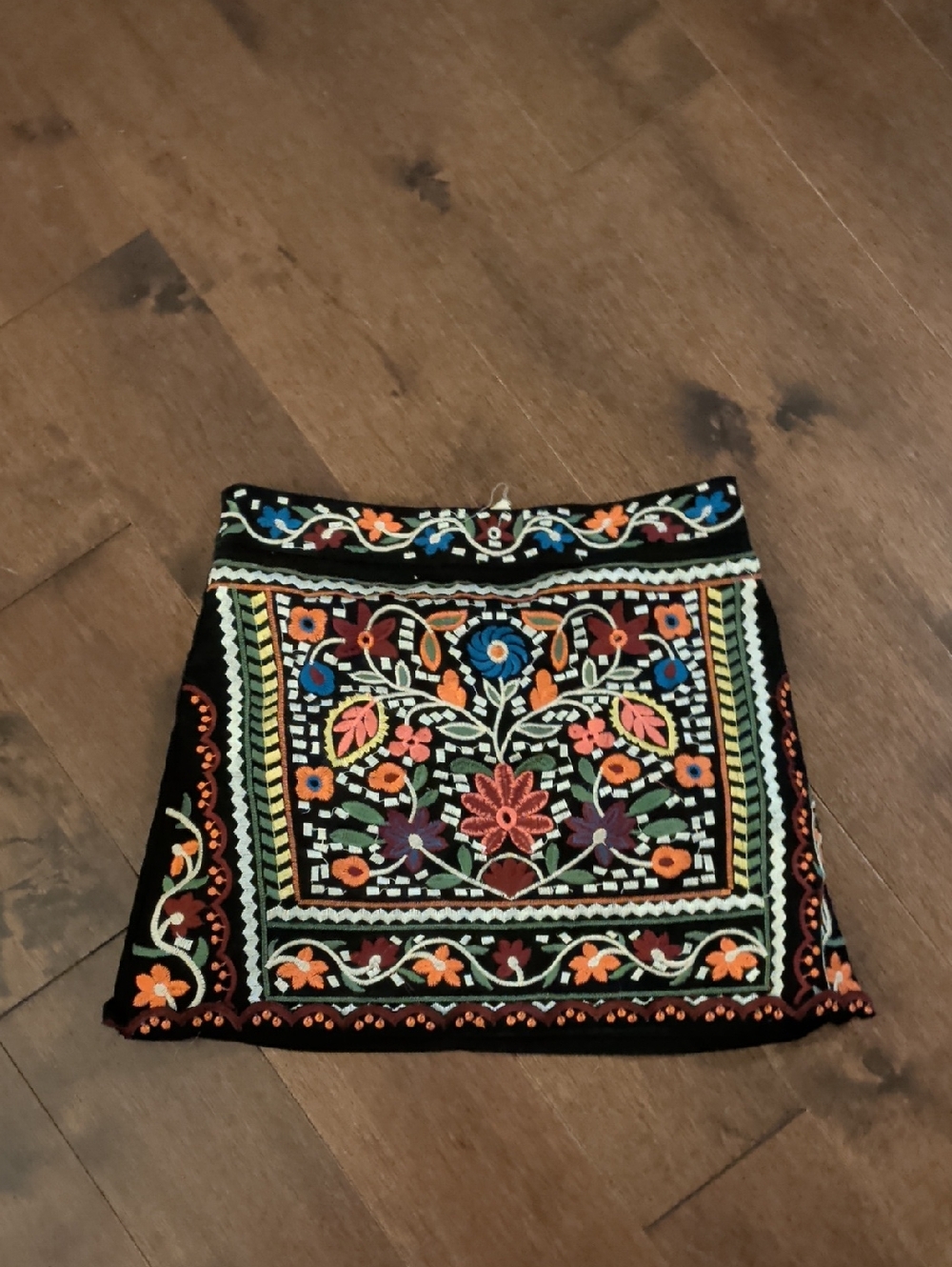 vestique Black Mini Skirt with Multicolor Floral Embroidery‎